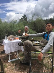 fly fishing father and son